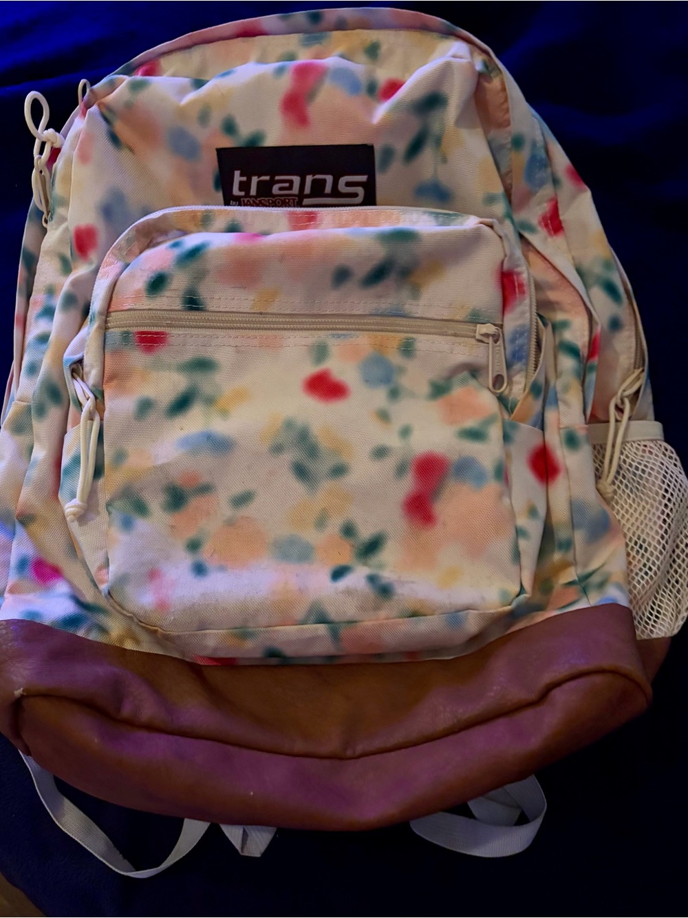 JanSport Trans Backpack in Cream with Pink, Blue, Green and Yellow Accents